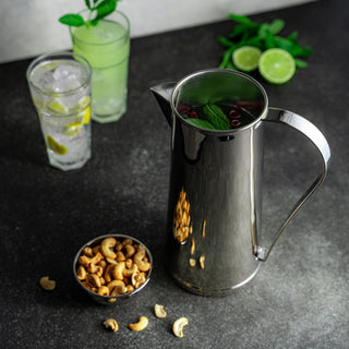 handmade stainless steel water pitcher for home and restaurant use, elegant and durable beverage jug for daily use and entertaining, polished stainless steel drink pitcher with ergonomic handle and precision spout, high-quality rust-resistant pitcher for serving water juice and iced tea, sleek and modern drinkware for stylish kitchen and dining table settings