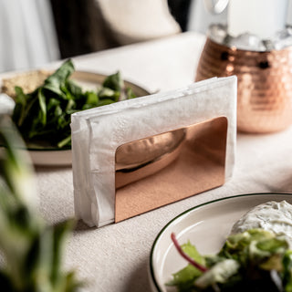 Handmade pure copper napkin holder with a polished finish, designed for neatly organizing napkins on dining tables, kitchen counters, and restaurant settings.