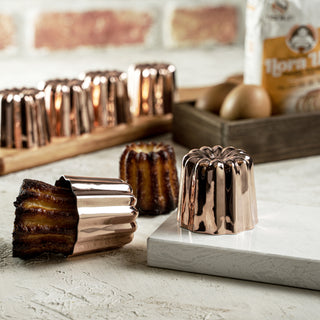 handmade solid copper canelé mold set, traditional French pastry baking cups, authentic canelé molds for professional bakers, fluted copper molds for gourmet desserts, durable copper baking molds for mini cakes, handcrafted copper canelé tins with tin lining, 