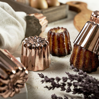 handmade solid copper canelé mold set, traditional French pastry baking cups, authentic canelé molds for professional bakers, fluted copper molds for gourmet desserts, durable copper baking molds for mini cakes, handcrafted copper canelé tins with tin lining, 