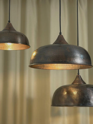 Complete set of handmade dark copper dome pendant lights with hammered detailing, available in customizable finishes and sizes, including solid copper assembly parts and a textile cord.